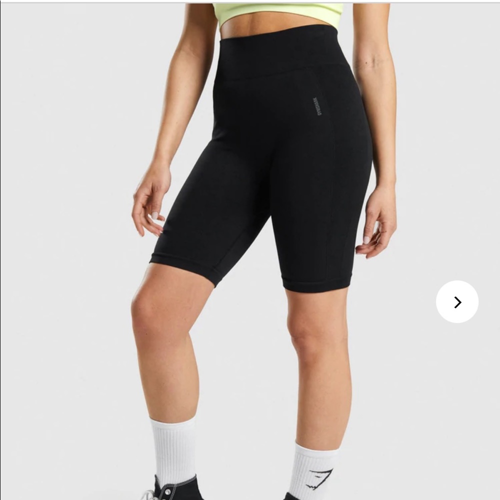 Black gymshark cycling shorts, sports bra, long sleeve